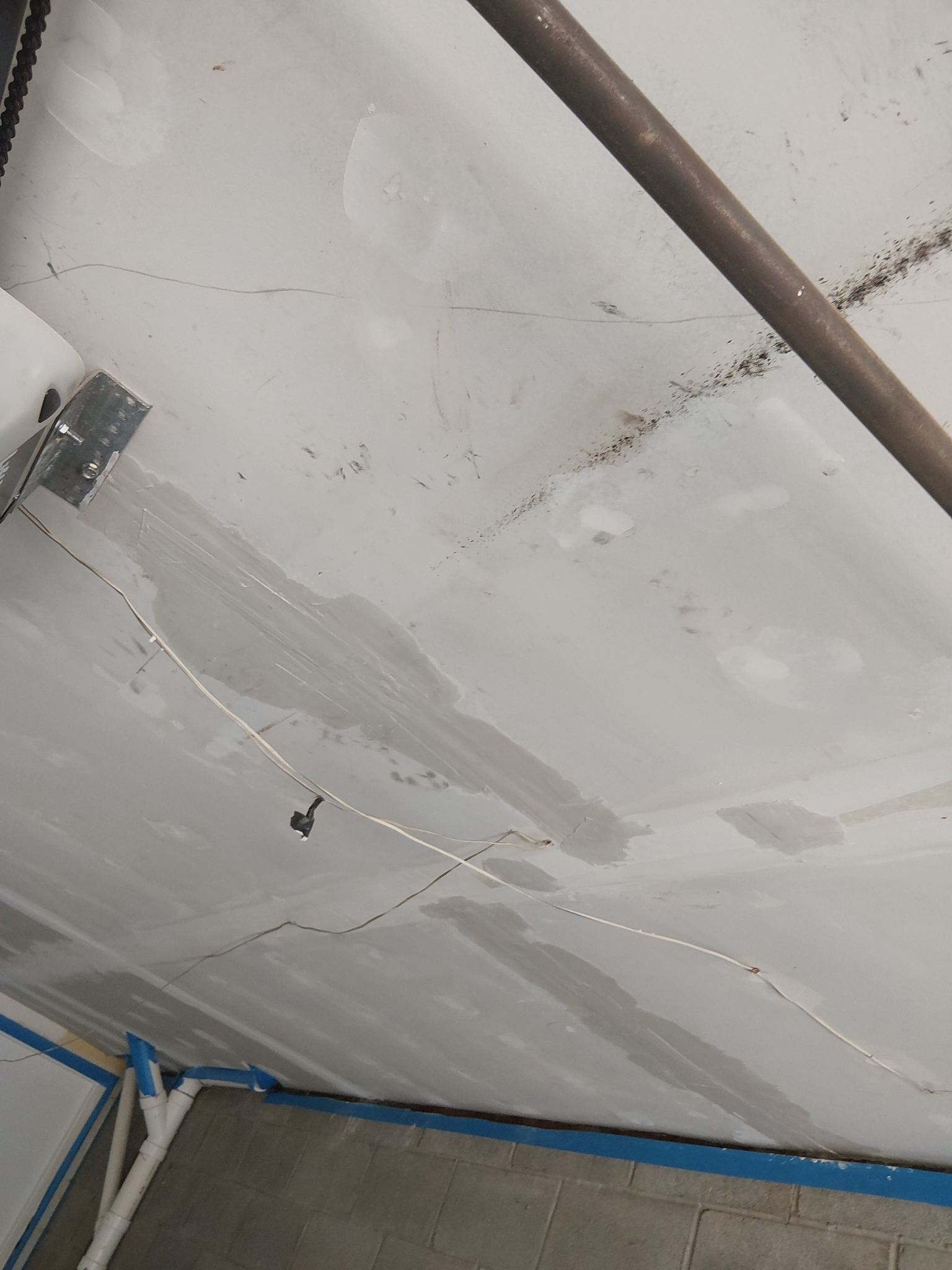 Ceiling seam retaped and covered with joint compound